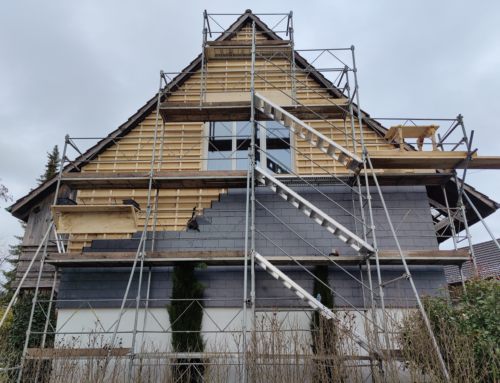 Renovation of house facade with slate bricks